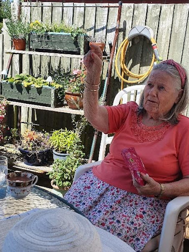 A client of Right at Home Portsmouth in her garden