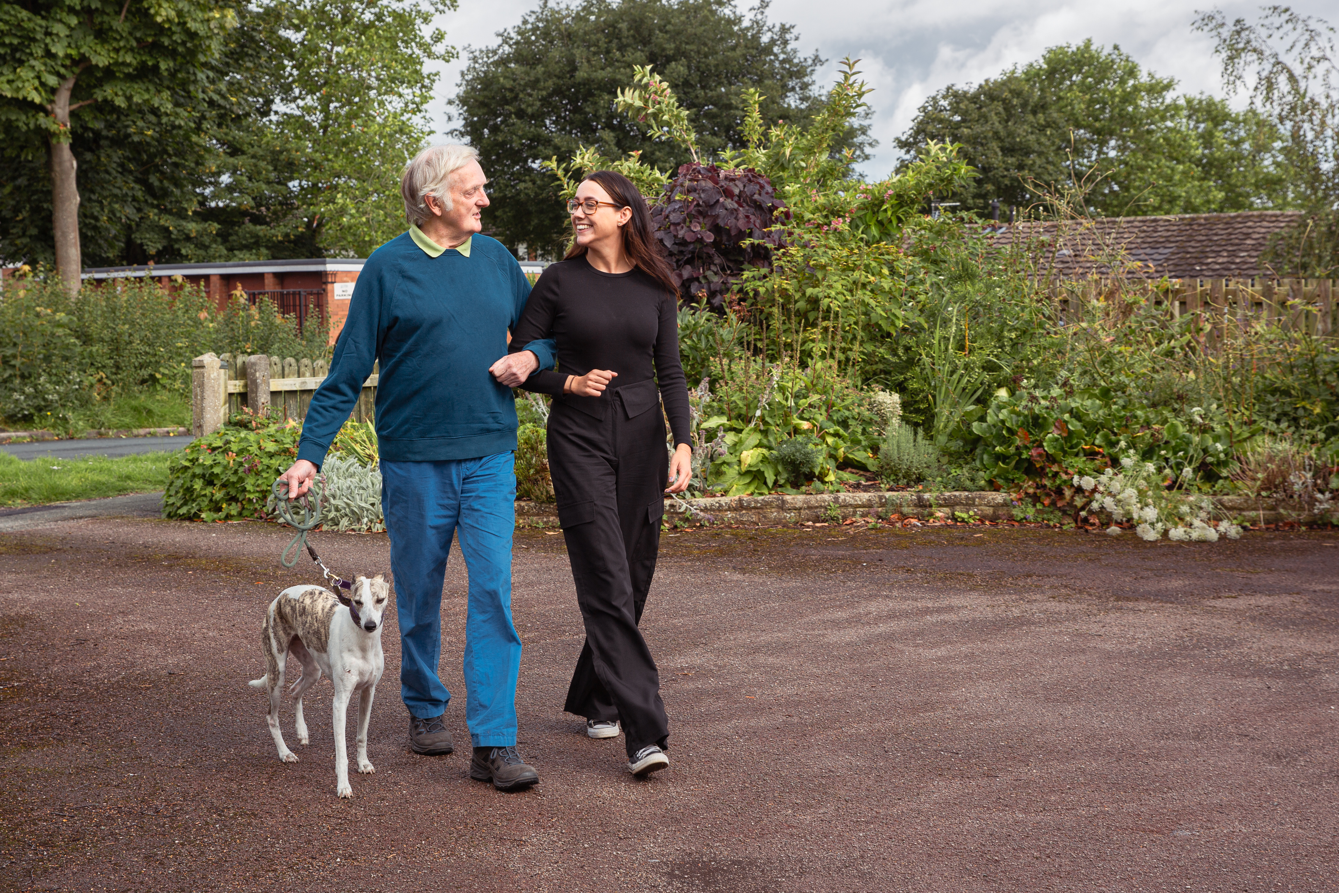 Client and CareGiver walking together