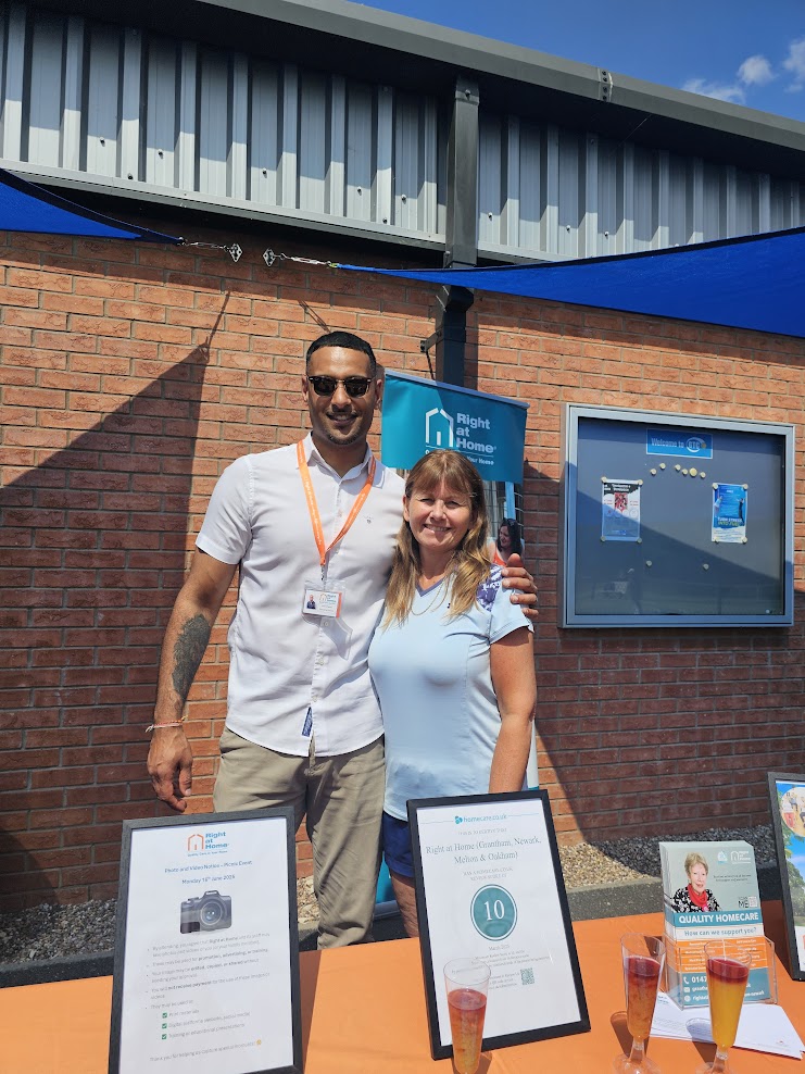 anand and care professional enjoying big green picnic