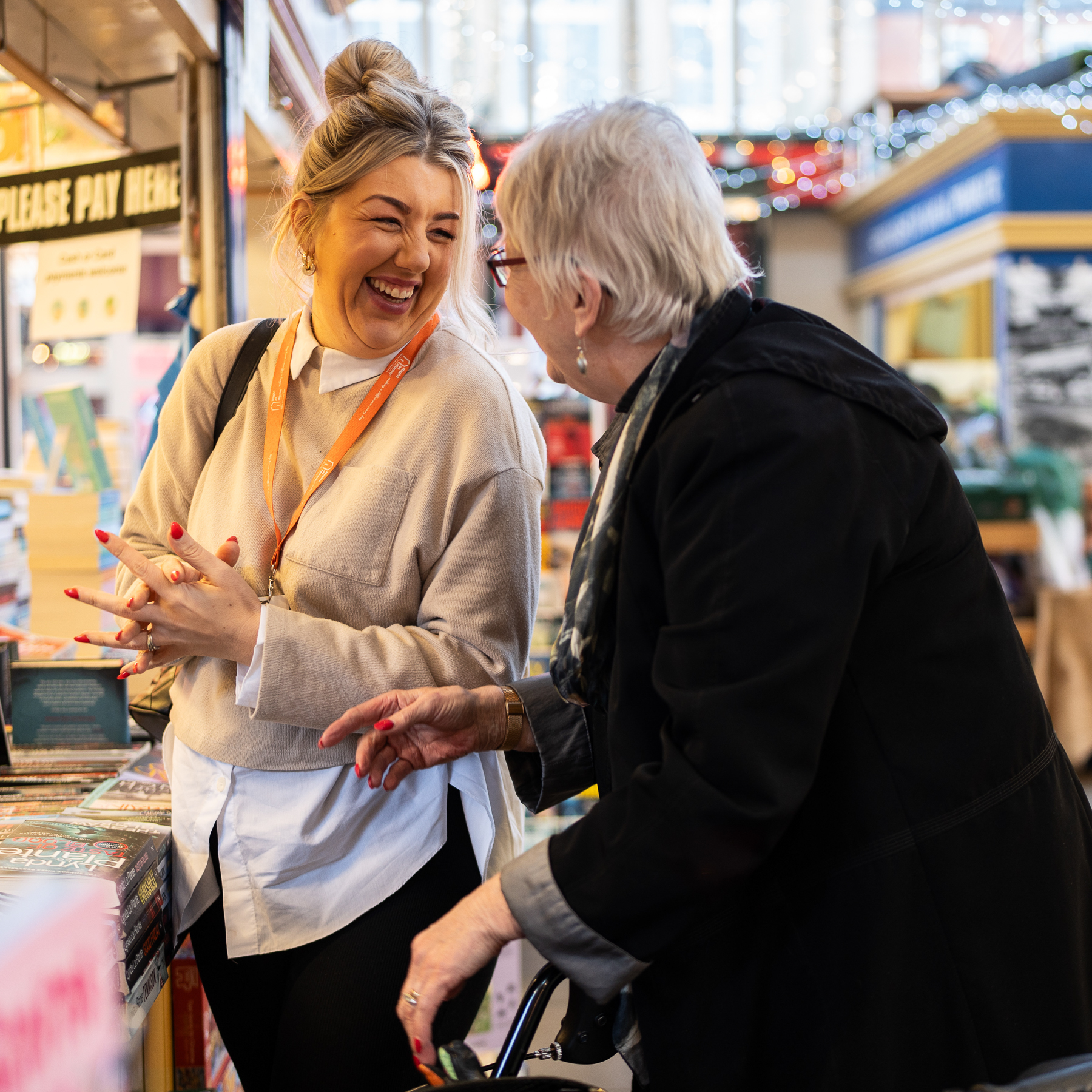 Client and Carer in a market.