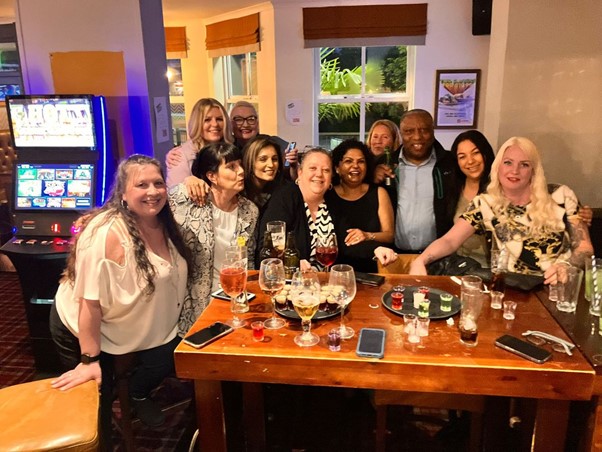Image of CareGivers celebrating birthday drinks