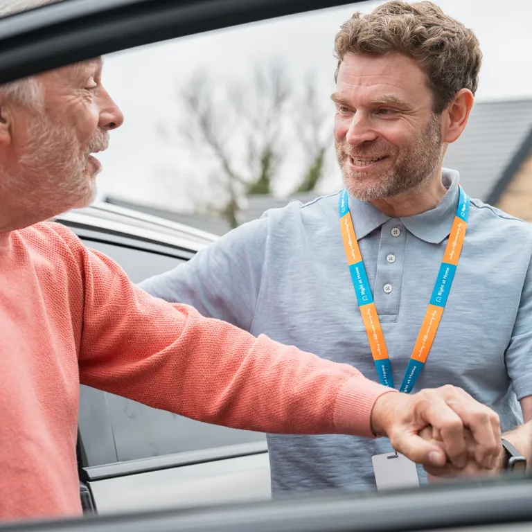 Carer supporting a Client with dementia to visit the local shops