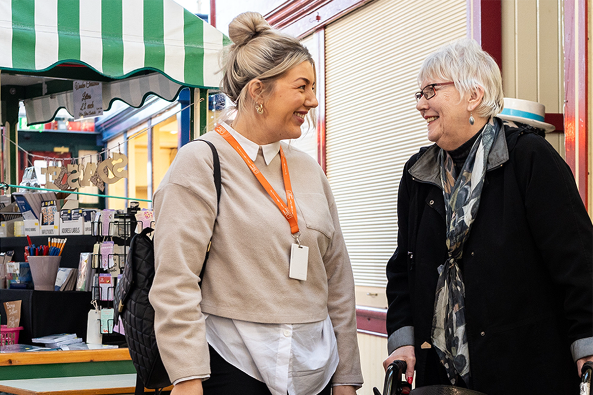 Client and Carer at market