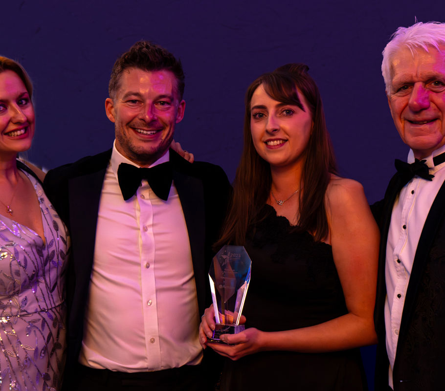 homecare franchise owners and leaders pose for award photograph