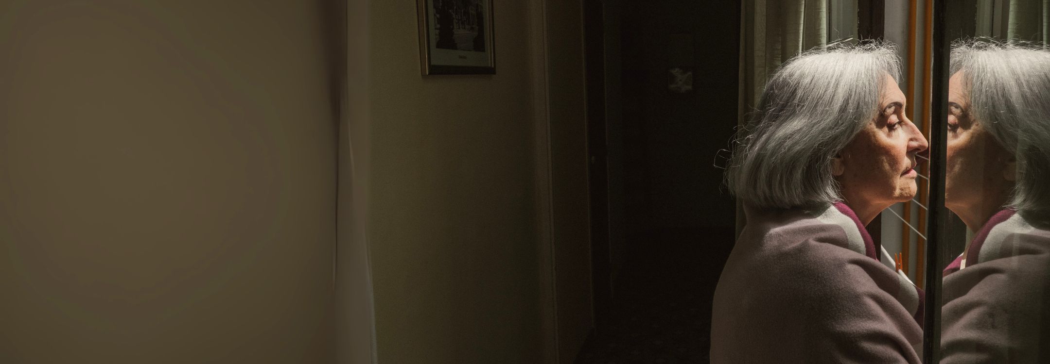 old-lady-starring-out-of-a-window