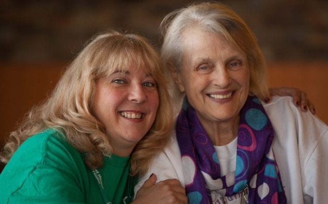 Elderly Lady Smiling with Care Assistant