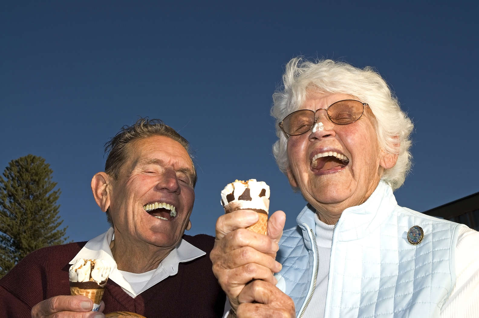 Two Elderly Man Laughing with Ice Creams