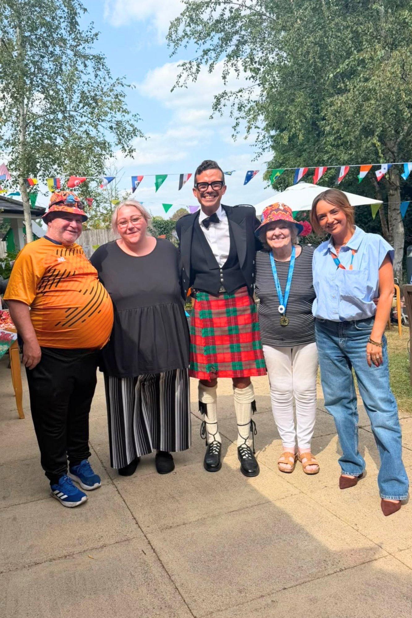 Right at Home and Heol Don Care Home staff with residents at the Big Green Picnic