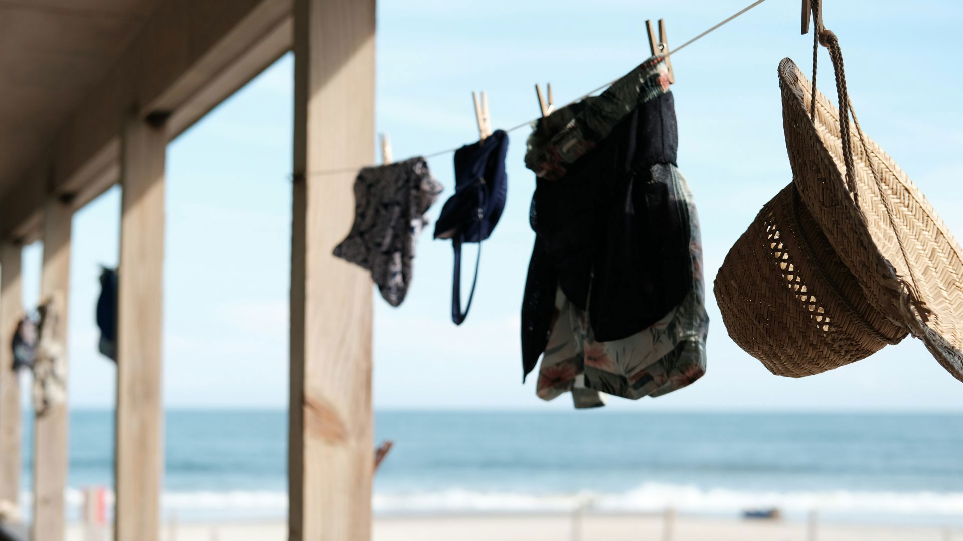 clothes on washing line by beach