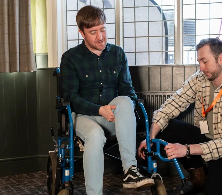 Carer and Client enjoying a day out at the local open mic night