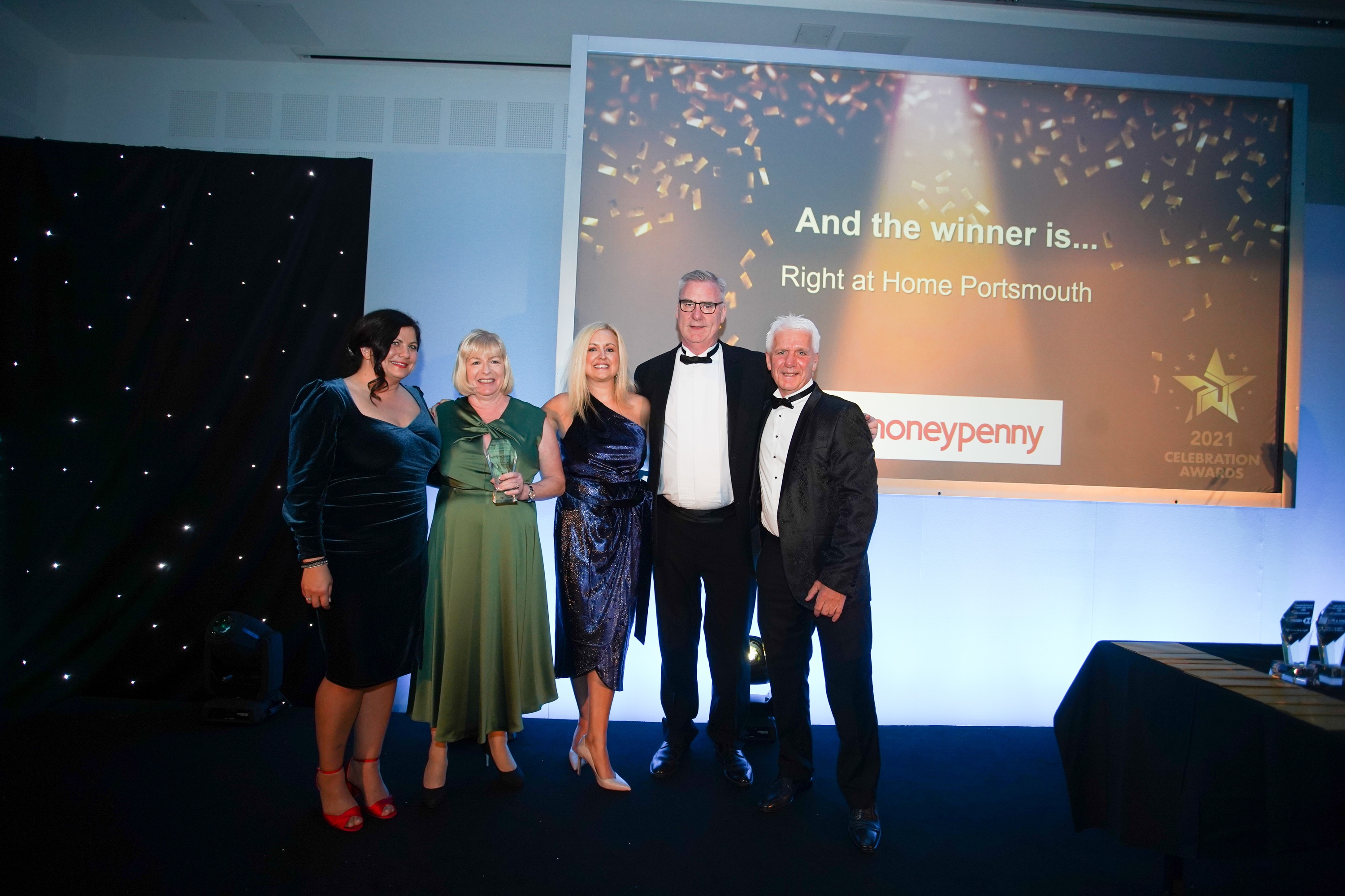 Right at Home Portsmouth owners receiving their reward