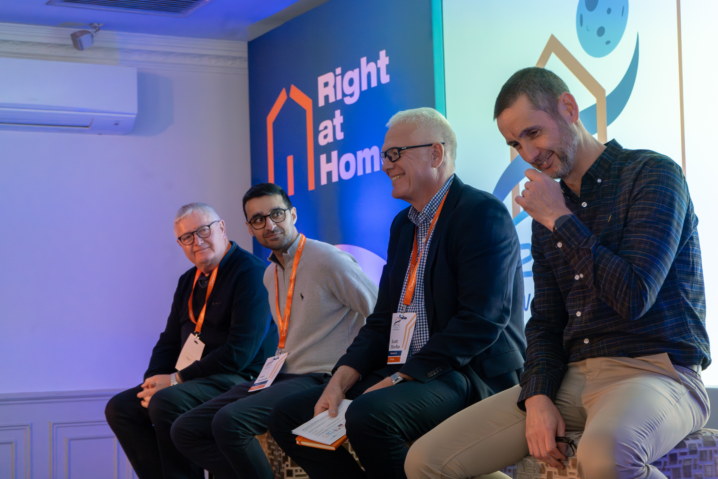 franchise owner panel discusses homecare on stage