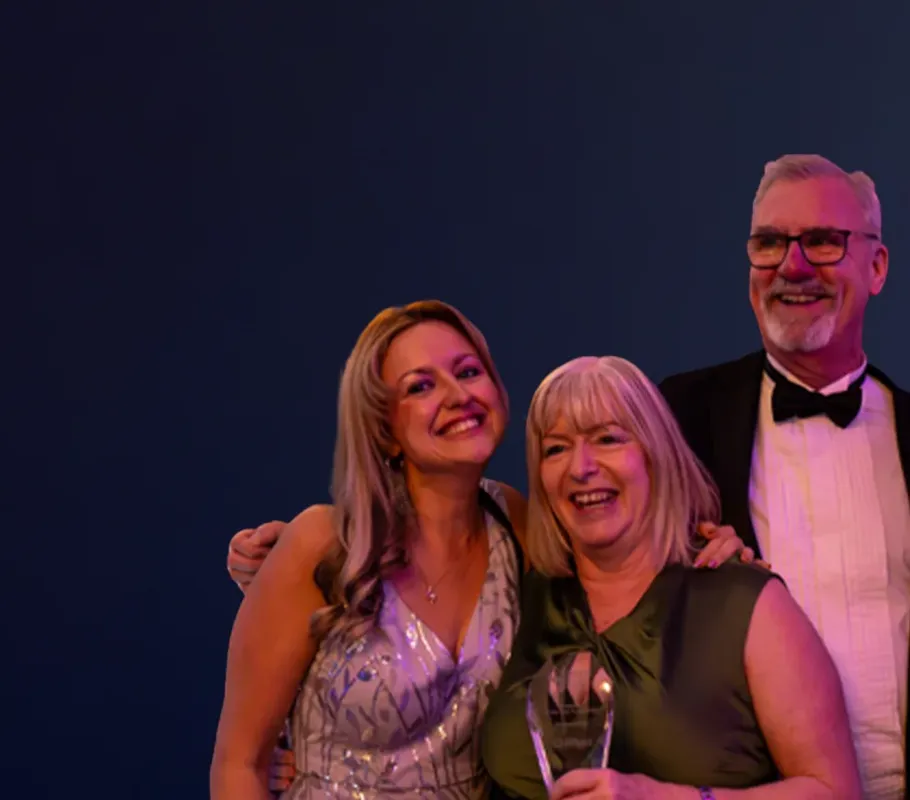 homecare franchise owners and leaders pose for award photograph