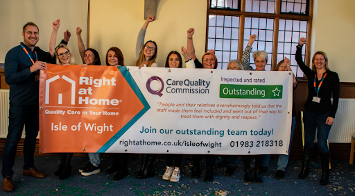 Right at Home Isle of Wight team celebrating their Outstanding rating